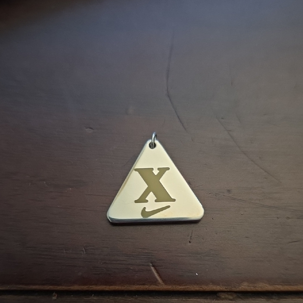 Tiffany & Co. Silver Pendant with Minimalist Design